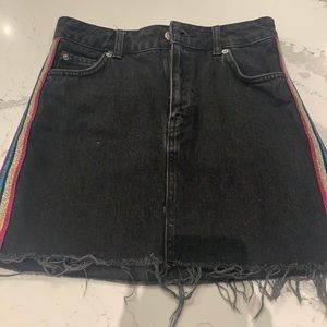 Black denim skirt with sparkly multi color stripes